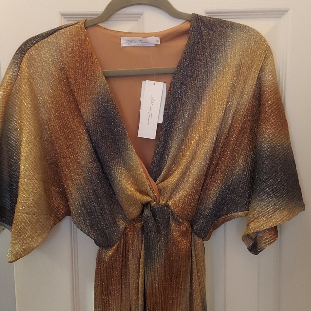 Dolman Sleevs Plisse, intriguing dress.